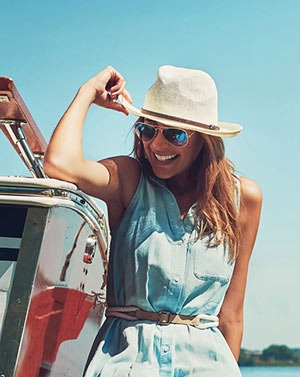 Woman on back of boat.